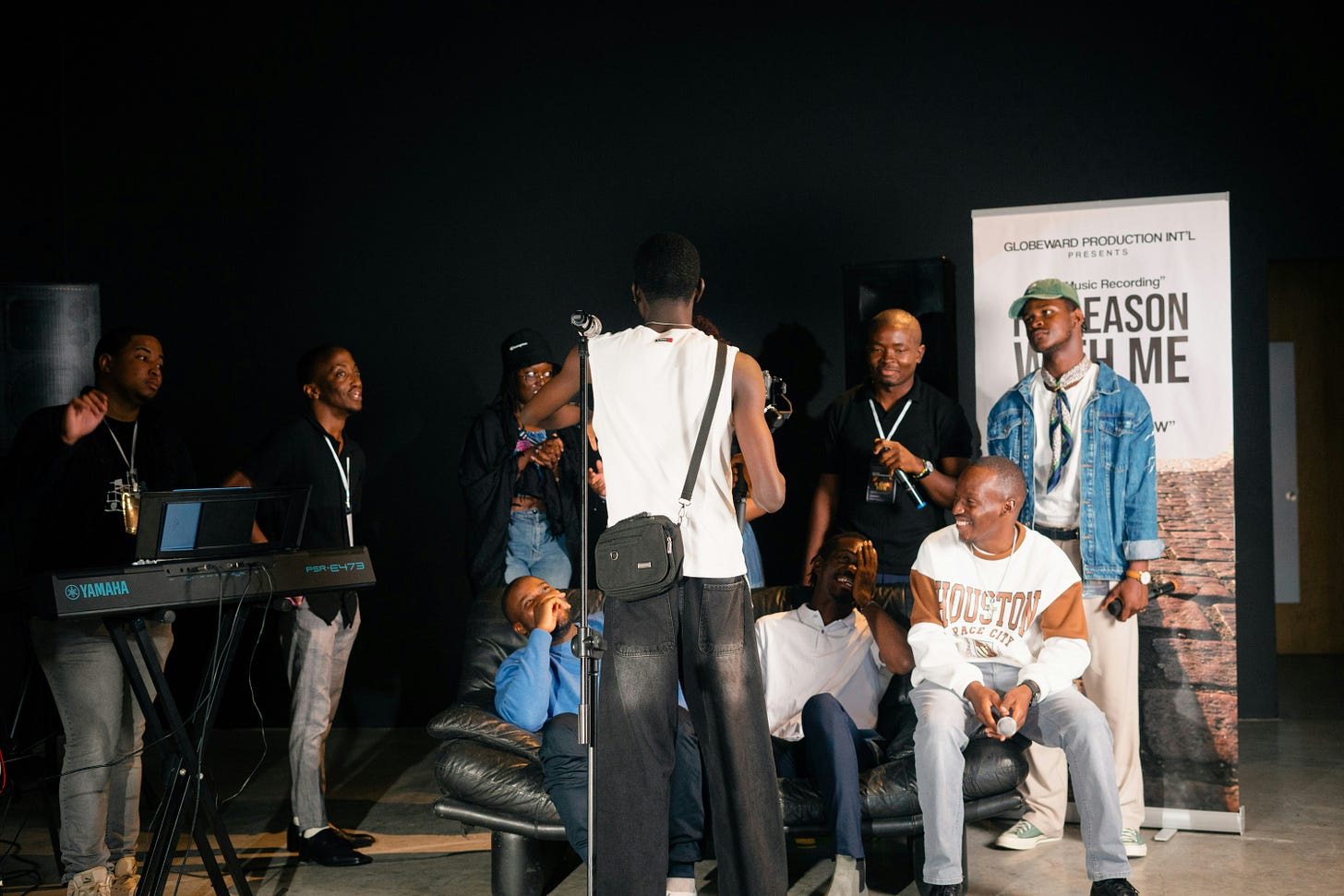 Creative directors and copywriters working together in music production studio session Creative directors and copywriters working together in music production studio session