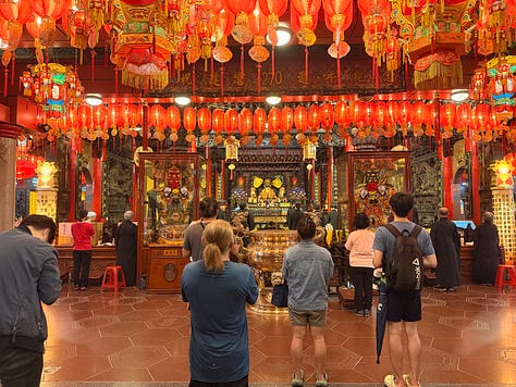 Offerings and prayers at Ciyou Temple