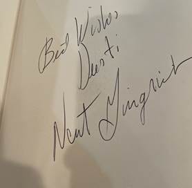 A close up of a whiteboard with black writing

Description automatically generated