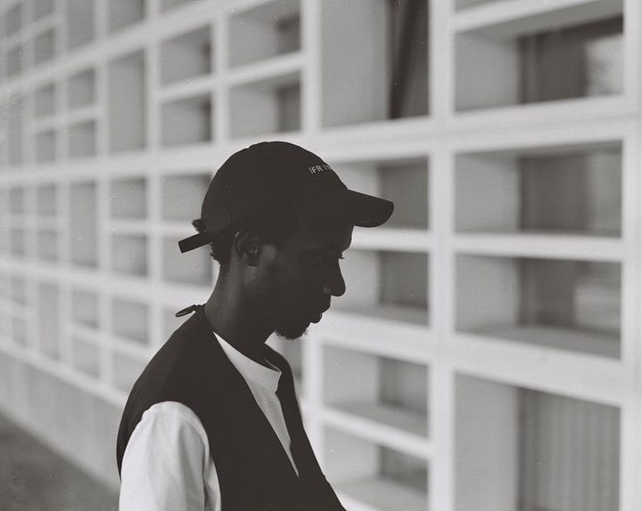 photos of KMRU and his new album cover