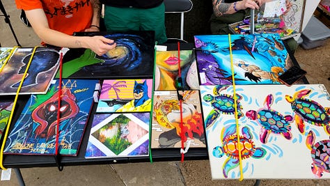 Face painting, the Downtown Farmer's Market, and artists selling their creations