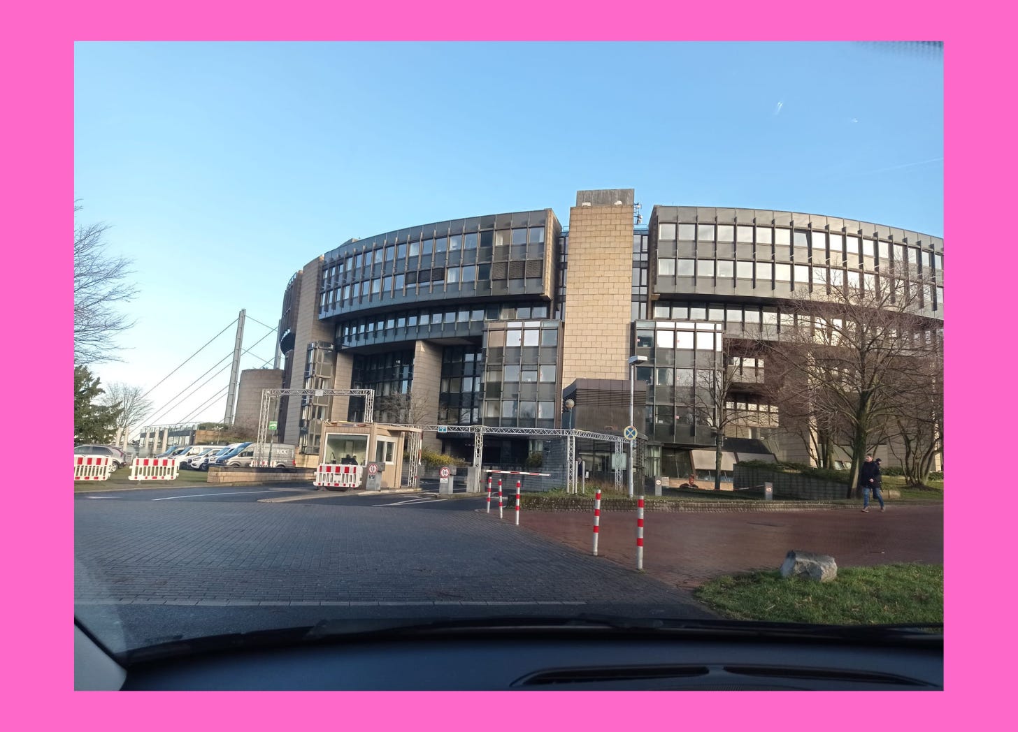 A side view of the state parliament building from Tobias' car.  The bridge over the Rhine river is in the background. 
