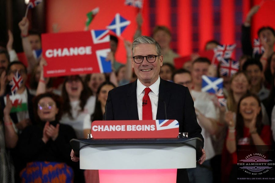 UK Prime Minister Keir Starmer at a 2024 'Change' rally, now framed by the April 2026 Mandelson vetting scandal and the resignation of Sir Olly Robbins.
