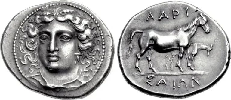 Ancient silver drachma coin from the mid-4th century BC used as a monetary medium in the ancient Greek world