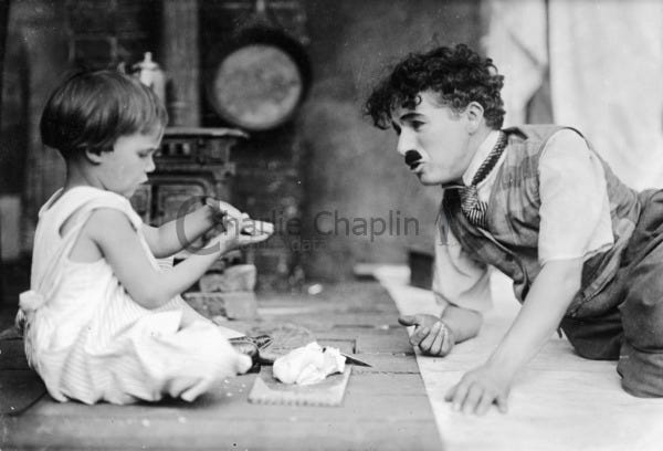 Jackie Coogan and Charlie Chaplin on the set of The Kid Jackie Coogan and Charlie Chaplin on the set of The Kid