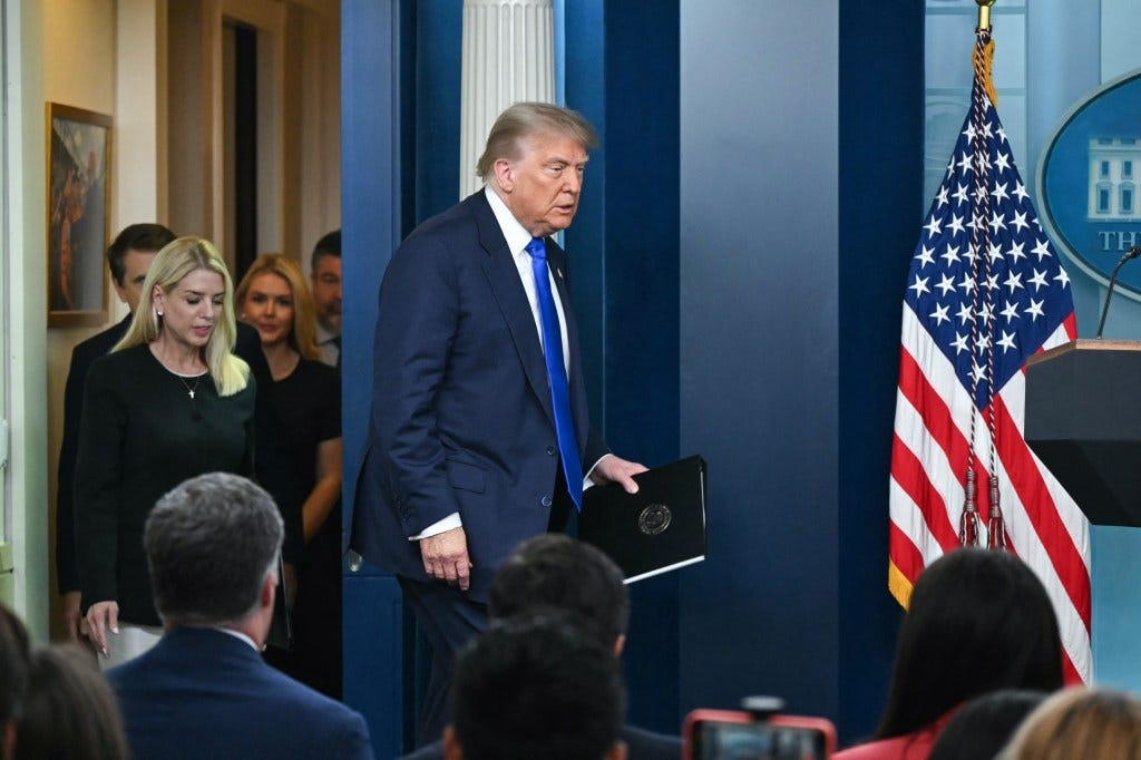President Trump arriving at a White House news conference.