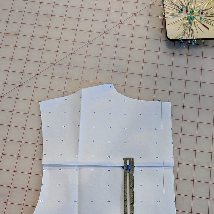 cyanotypes using various objects, a pattern being altered