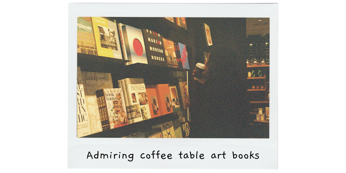 Admiring coffee table books with my partner