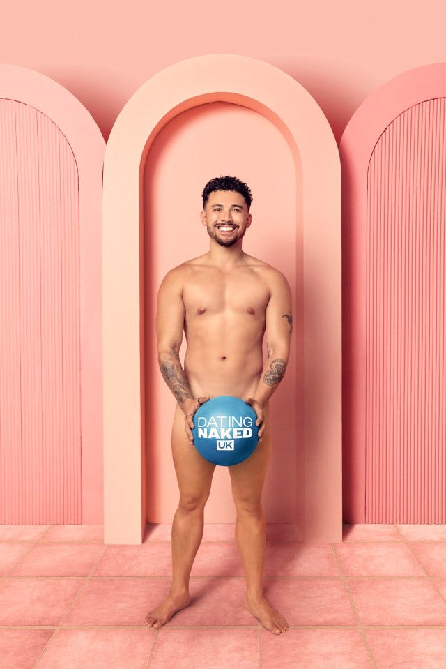 Connor holding a Dating Naked UK ball.