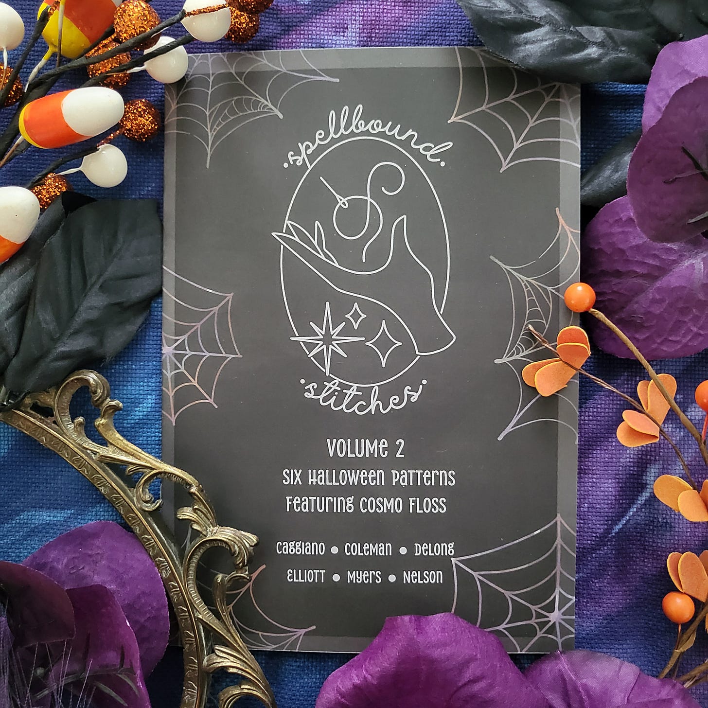 A staged photo of Stitchcraft Volume 2 booklet.
