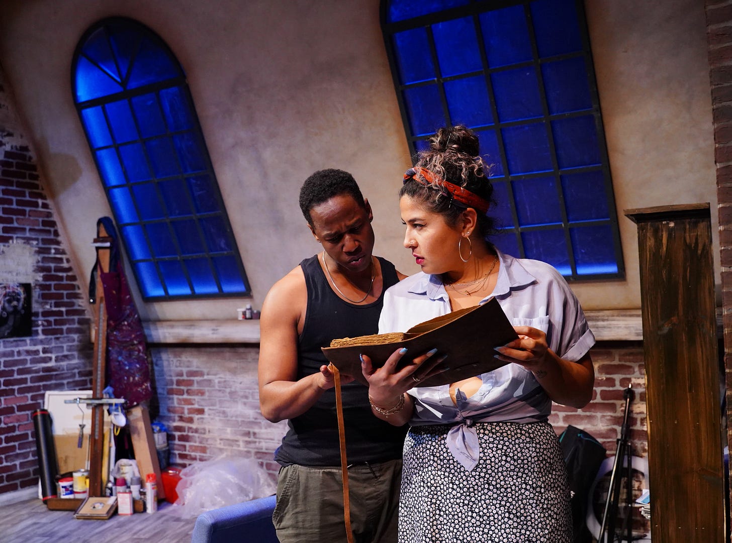 The actors Troy Rockett and Jordan Maria Don in a scene from The Displaced.