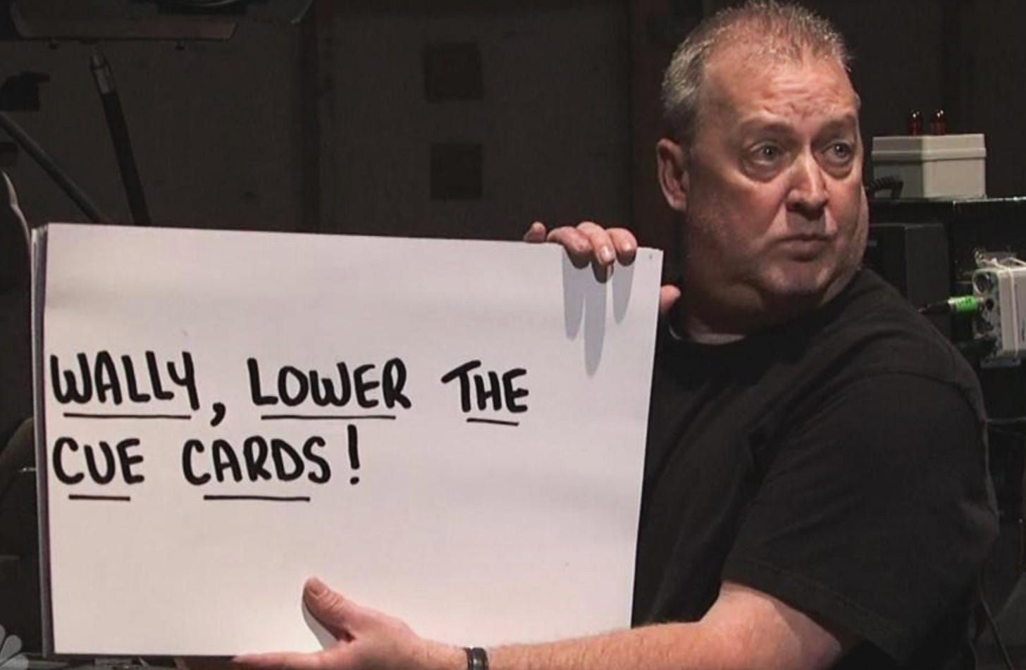 A person holding a sign
Description automatically generated A person holding a sign
Description automatically generated