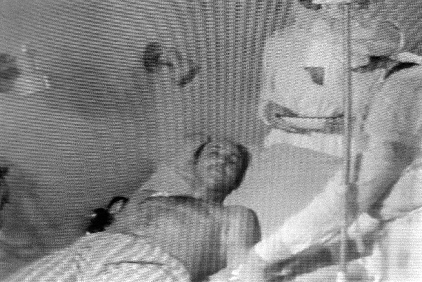 A Soviet technician meticulously checks water for radiation near Kiev on May 9, 1986, amidst hourly tests to ensure water safety post-Chernobyl.