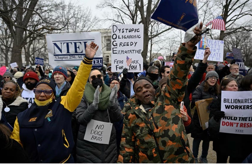 A group of people protesting
AI-generated content may be incorrect. A group of people protesting
AI-generated content may be incorrect.