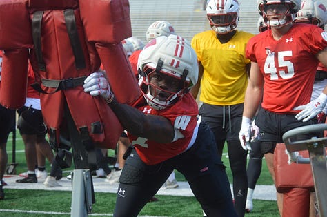 Wisconsin outside linebackers participate in individual position drills during the Badgers' spring football practice Saturday inside Camp Randall Stadium.