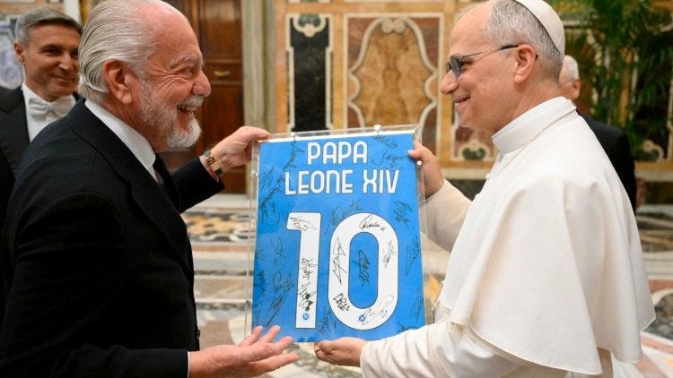 Pope Leo receives a Napoli shirt from Naples owner Aurelio De Laurentiis
