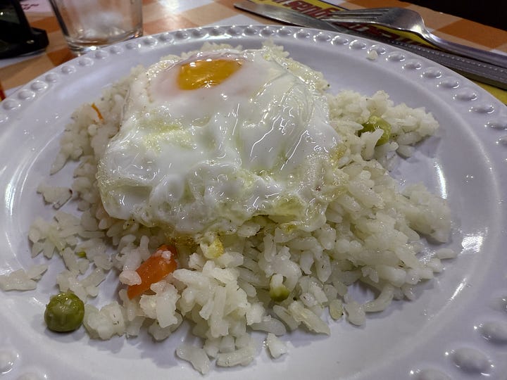 Watermelon agua fresca, cream soup, rice with egg, mole with chicken