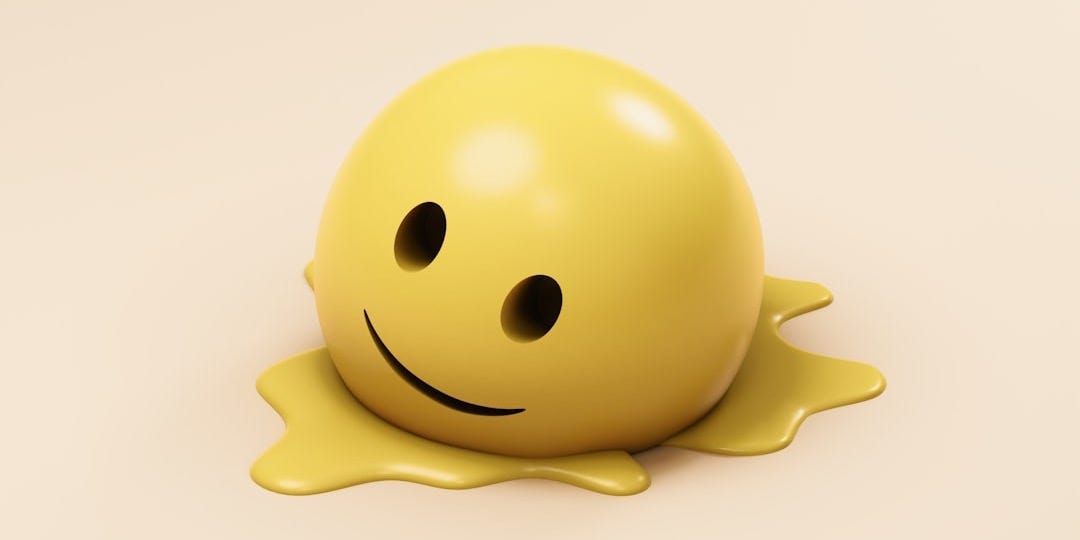 A melting smiley face on a creamy background.