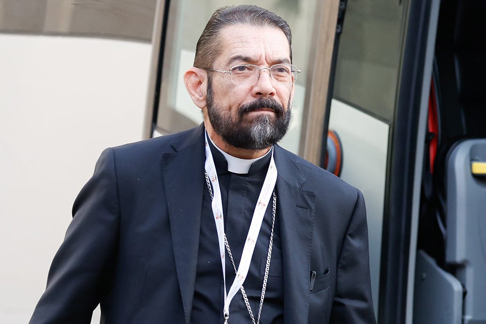U.S. Bishop Daniel Flores of Brownsville, Texas, arrives for a working session of the assembly of the Synod of Bishops at the Vatican Oct. 16. (CNS/Lola Gomez) U.S. Bishop Daniel Flores of Brownsville, Texas, arrives for a working session of the assembly of the Synod of Bishops at the Vatican Oct. 16. (CNS/Lola Gomez)