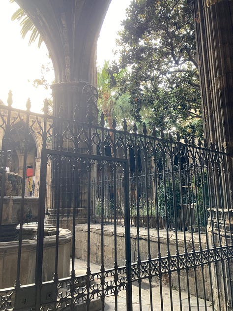 The Surrender--pics of gardens, flowers, cross, and archway