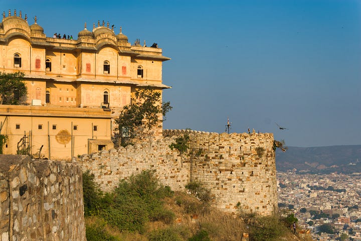 Images of the buildings and ramparts of the Nahargarh Fort in the late afternoon sun.