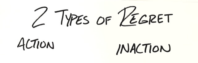 a handwritten note in black sharpie on white paper that says: 2 types of regret: Action & Inaction