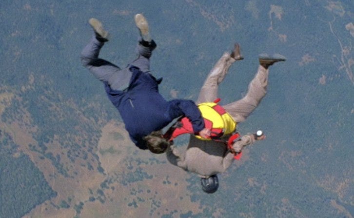 Roger Moore and His Stuntman in Blue Blazers Skydiving in Moonraker – Bond  Suits