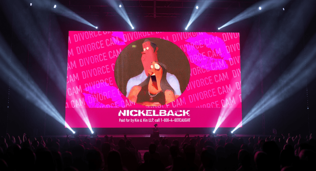 A silhouette of a man standing on a beach during sunset, with an orange and blue sky in the background.