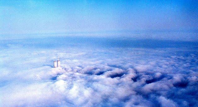 The original New York twin towers seen from above clouds. The original New York twin towers seen from above clouds.