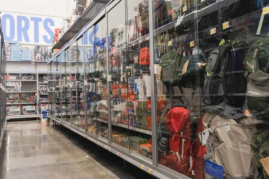 A store with a variety of backpacks

Description automatically generated