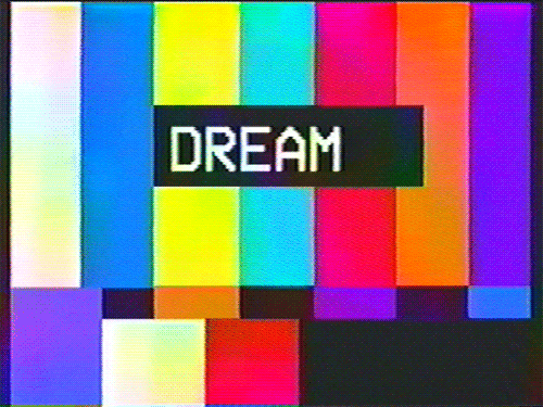 The word DREAM superimposed on old VHS color bars.