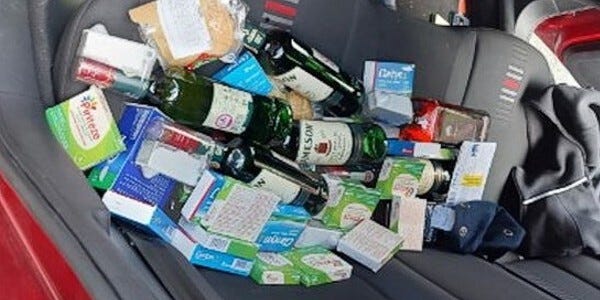 Goods recovered from back seat of a car