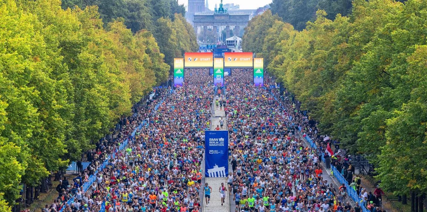 Runners taking part in the Berlin Marathon Runners taking part in the Berlin Marathon