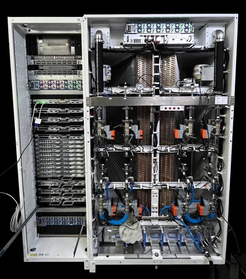 An image of an open server rack showcasing an intricate setup of hardware components, including multiple server units, cables, cooling systems, and various technical equipment.