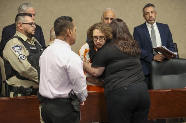 Adriana Zandri, widow of Ivan Manzano killed during the Walmart mass shooting, hugs defendant Patrick Crusius during a plea hearing in El Paso, Texas, Tuesday, April 22, 2025. (Ruben R. Ramirez/Pool Photo via AP)