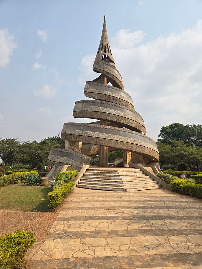 Monument that looks like a tapering spiral, in late afternoon sun. Monument that looks like a tapering spiral, in late afternoon sun.