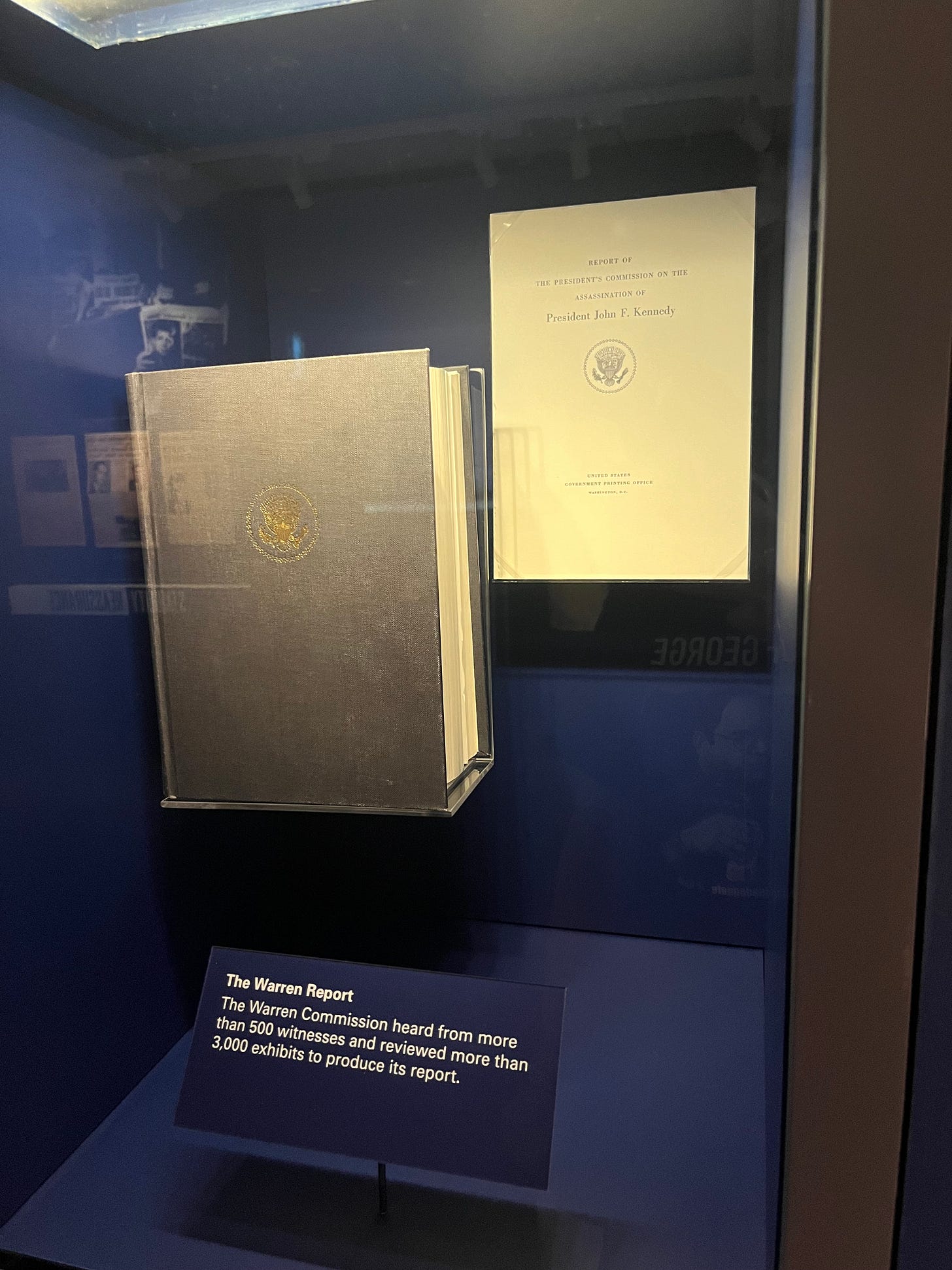 Photo of Warren Report through glass at the LBJ Library
