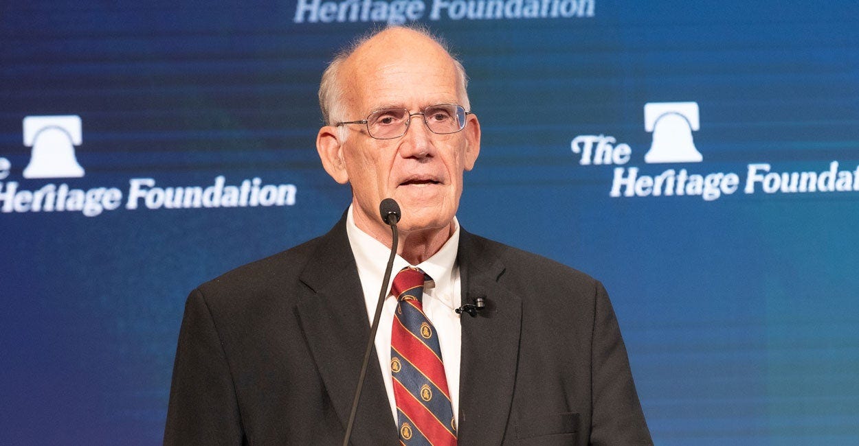 Victor Davis Hanson against a blue Heritage Foundation backdrop. Victor Davis Hanson against a blue Heritage Foundation backdrop.