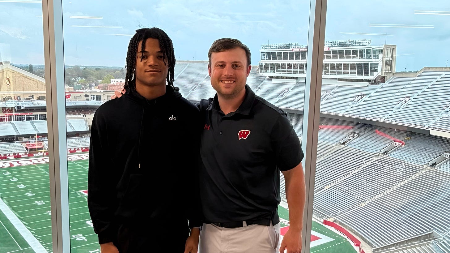 Wisconsin Badgers commit DJ Davis with safeties coach Jack Cooper. 