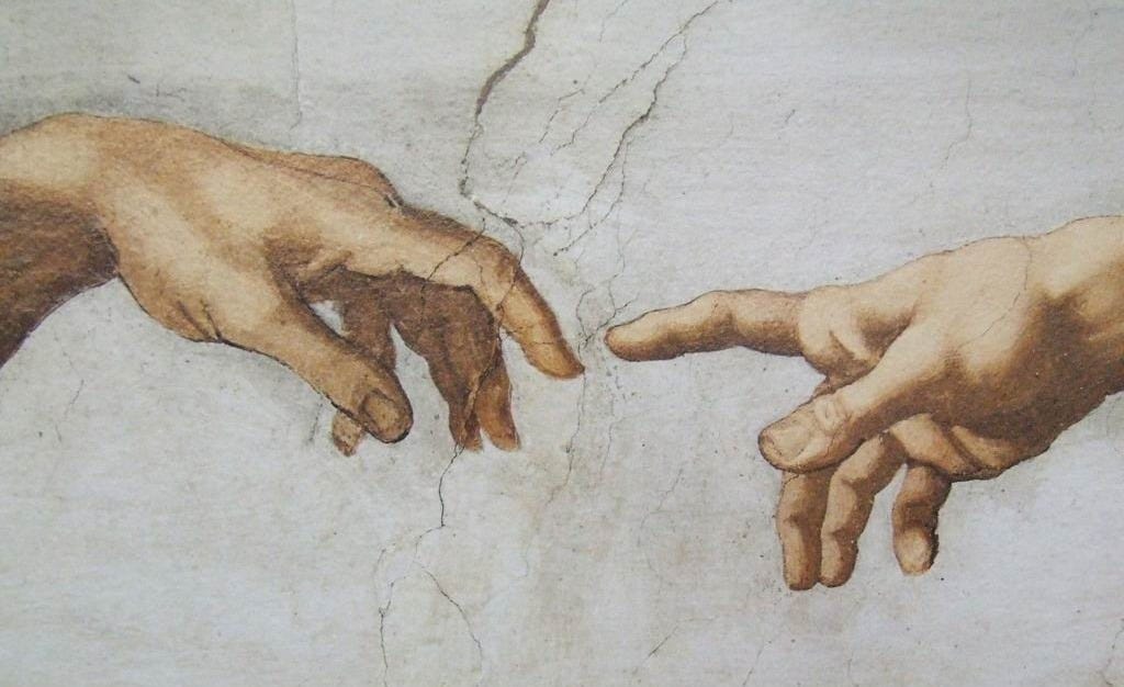 Detail of two hands touching from the Sistine Chapel Detail of two hands touching from the Sistine Chapel