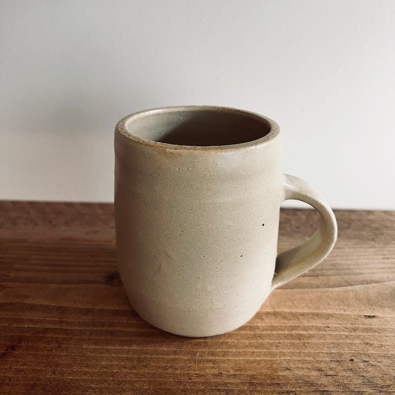 Handthrown Mug Medium in Buttercream. Proceeds to Carers UK. image 1