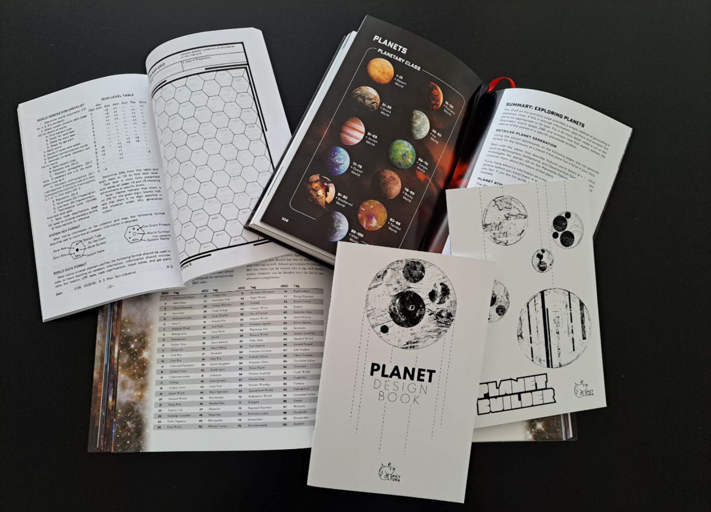 Several space-travel ttrpgs open onto their planet generation pages.