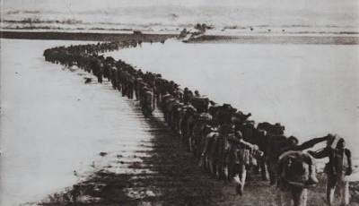 Chinese volunteers crossing the Yalu River into North Korea during ...