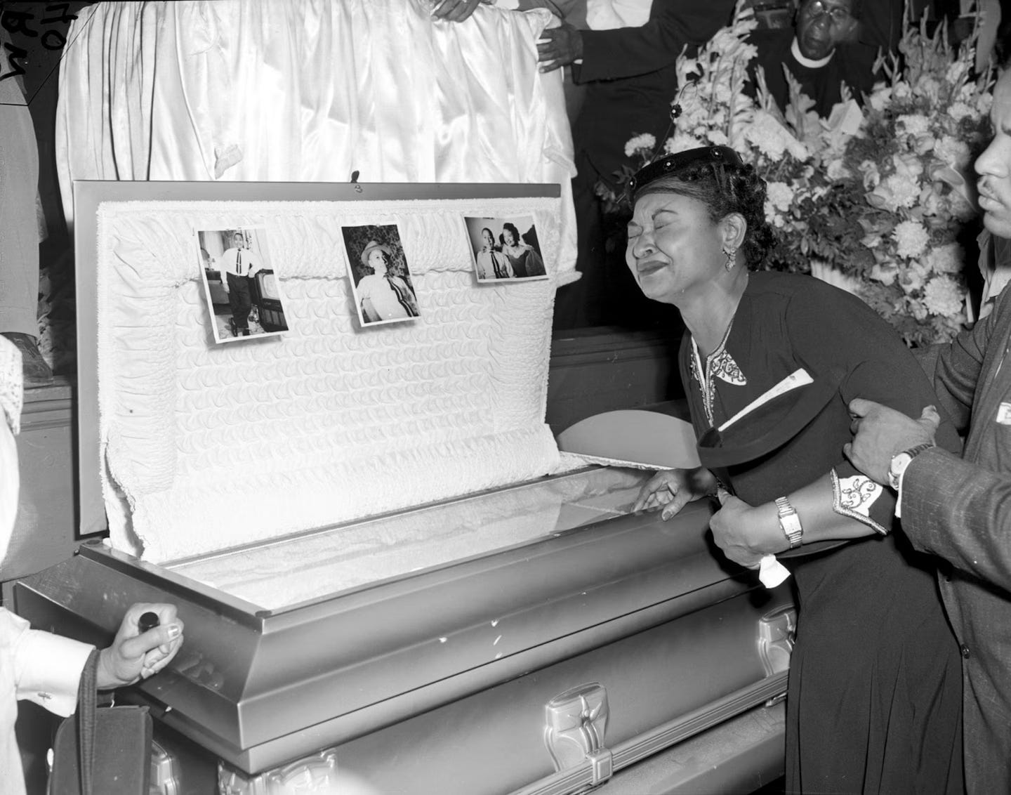Mamie Till Mobley weeps at her son's funeral on Sept. 6, 1955, in Chicago. The mother of Emmett Till insisted that her son's body be displayed in an open casket, forcing the nation to see the brutality directed at blacks in the South. (Chicago Sun-Times/AP)