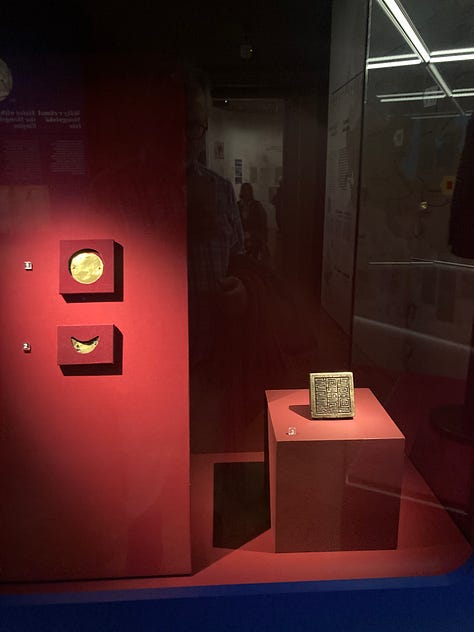 Pictures of a ceramic camel, a pizza, the seal of a General, a Garuda mask, a yurt, a lovely lady looking at a Yama, a map, and a timeline.