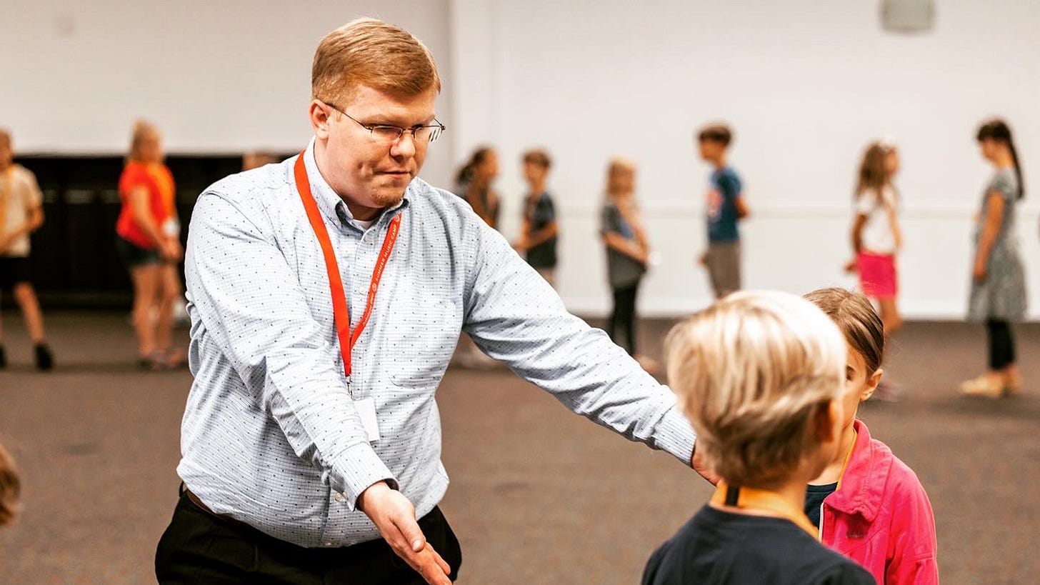 Jarrod Richey teaching elementary folk dancing at 2022 Jubilate Deo Summer Music Camp Jarrod Richey teaching elementary folk dancing at 2022 Jubilate Deo Summer Music Camp