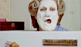 Robin Williams as Mrs. Doubtfire, applying excessive, caked-on foundation and powder to his face in a humorous attempt to create a perfect look. This image contrasts with the seamless application of the recommended concealers.