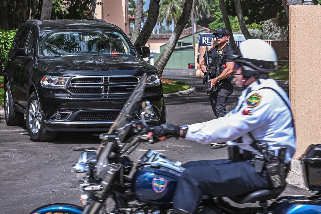 Local law enforcement officers patrol outside former President Donald Trump’s Mar-a-Lago property in Palm Beach, Florida on August 9, 2022.
