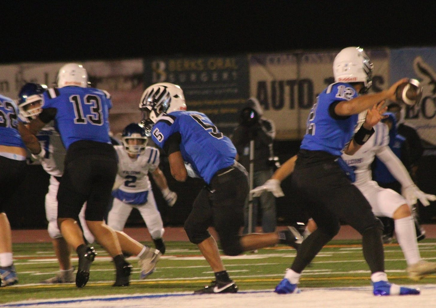 May be an image of football and text