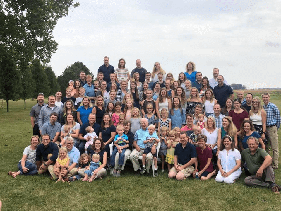 A group photo of my big, beautiful family a solid seven rows deep.